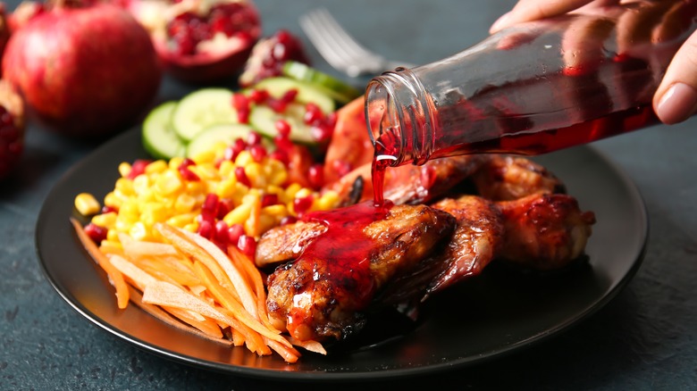 glazing chicken with pom molasses 