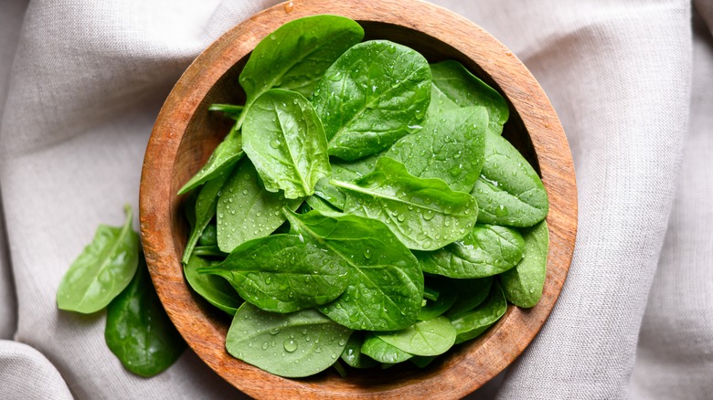 Freshly washed spinach leaves