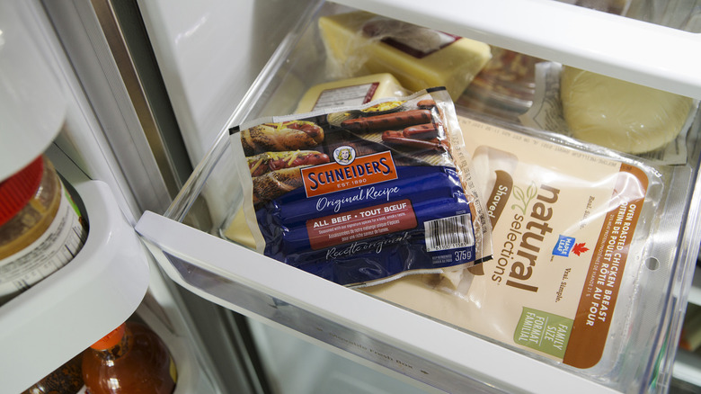 Hot dog package in fridge