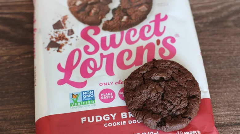 Sweet Loren's brand fudgy brownie cookie package with a baked cookie