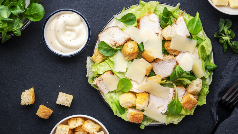 Caesar salad with dressing on the side