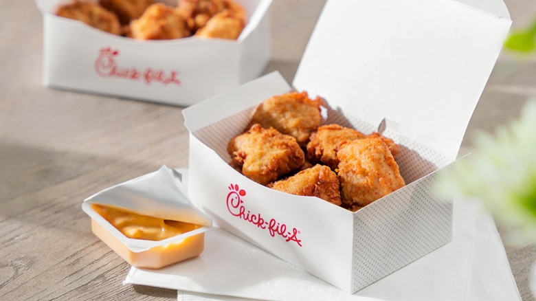 Chick-fil-A box of nuggets and side of sauce