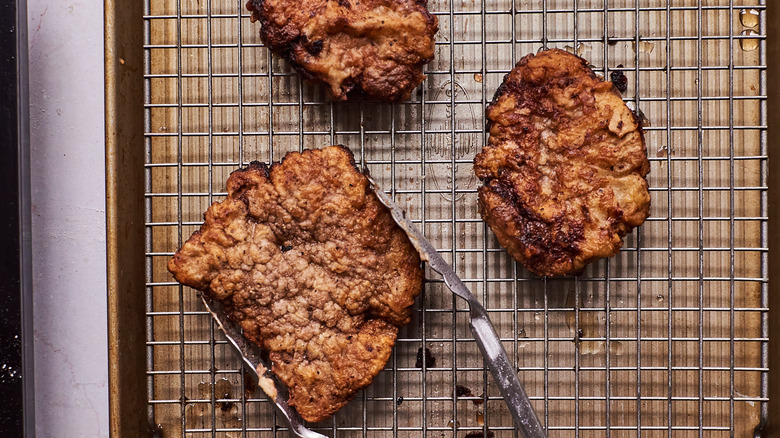 Chicken fried steak on wire rack