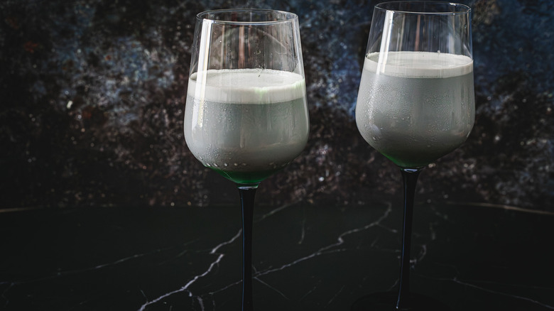 Two glasses with creme de menthe