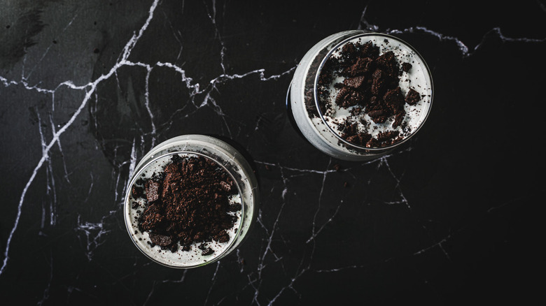 Overhead of two cocktails with Oreo crumbs