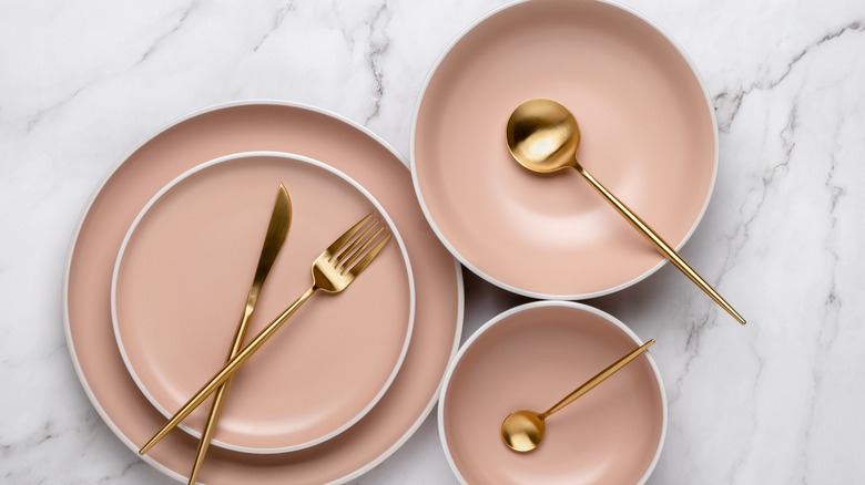 Place setting with cutlery and plates