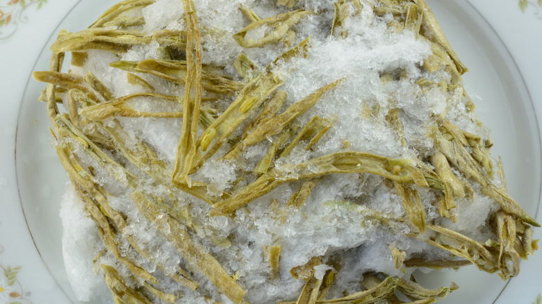 Freezer burned green beans on plate