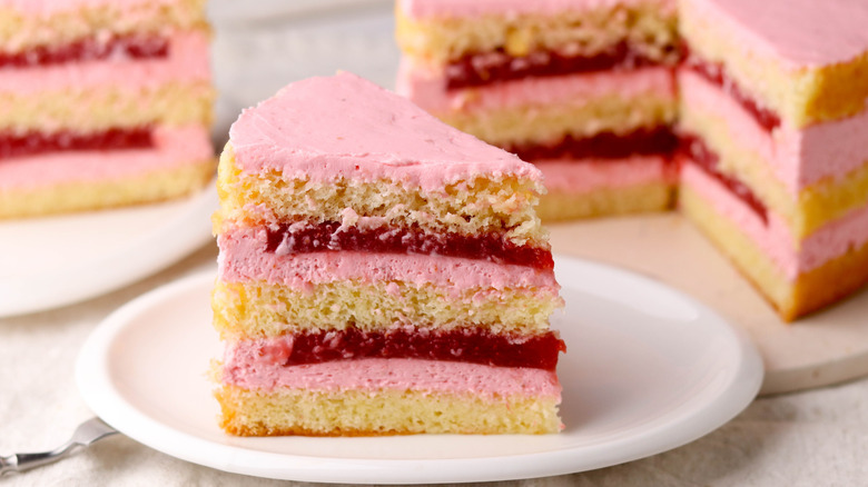 Strawberry cake on a plate with filling