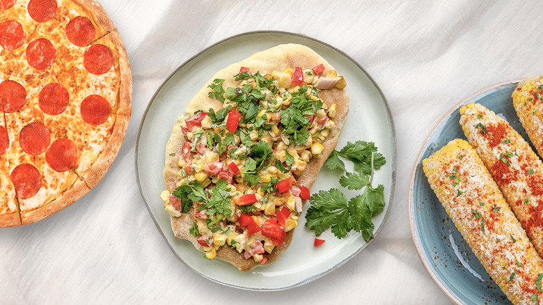 Pizza with elote topping