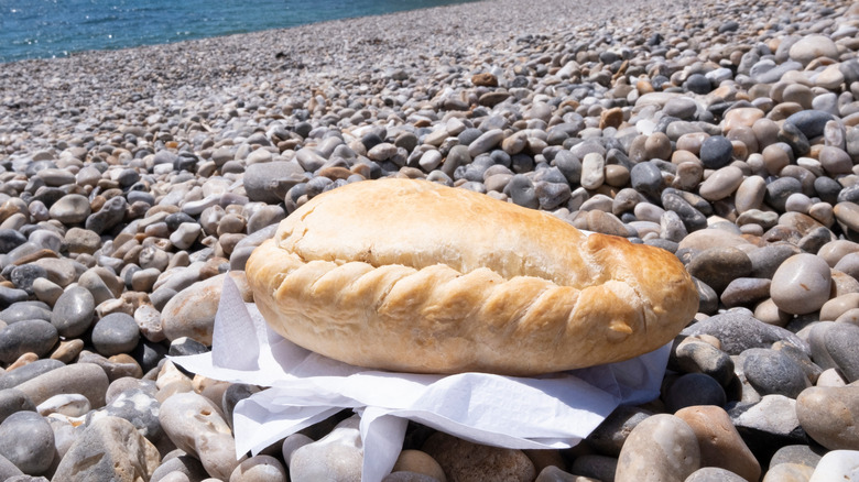 Cornish pasty on a beach