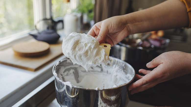 chef making whipped cream