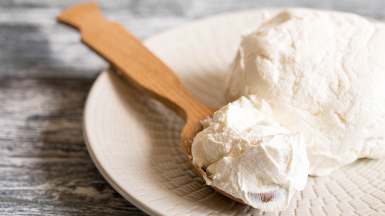 scoop of mascarpone cheese on spoon