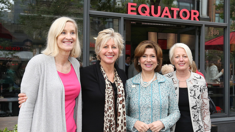 Four members of the Equator Coffees leadership team smiling