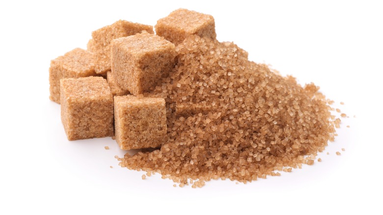 Cubes of brown sugar on a white background