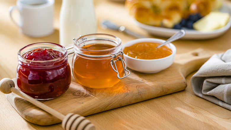 Jam and marmalade in containers 