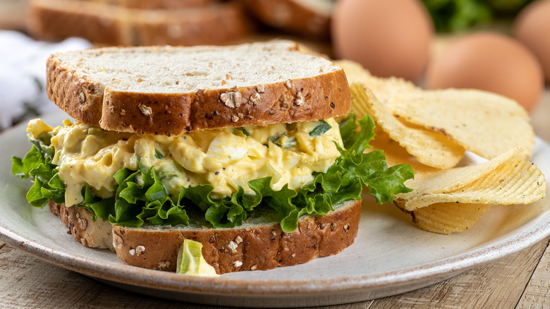 Egg salad sandwich with chips