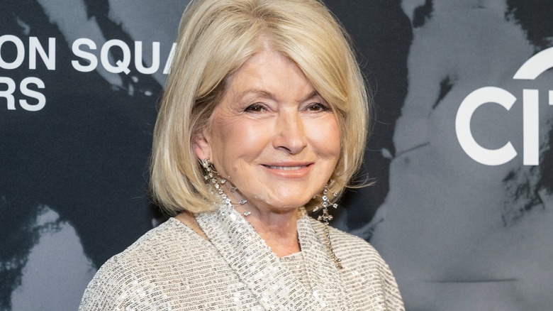 Martha stewart smiling in silver dress