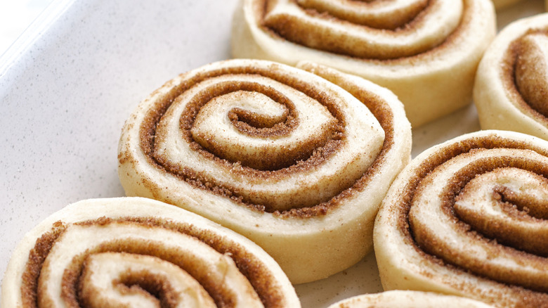 Close up of uncooked cinnamon roll dough