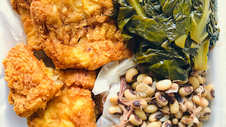 deep fried fish, collard greens and black eyed peas