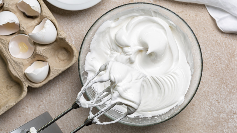 beaten egg whites in a bowl