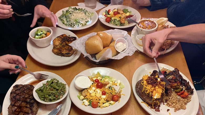 Texas Roadhouse meals and sides in restaurant