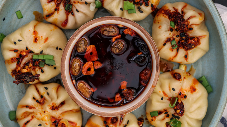 dumplings topped with chili crunch