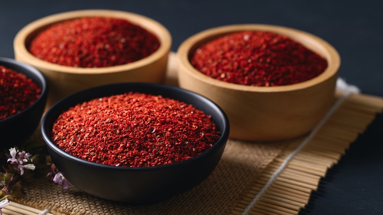 three bowls of paprika