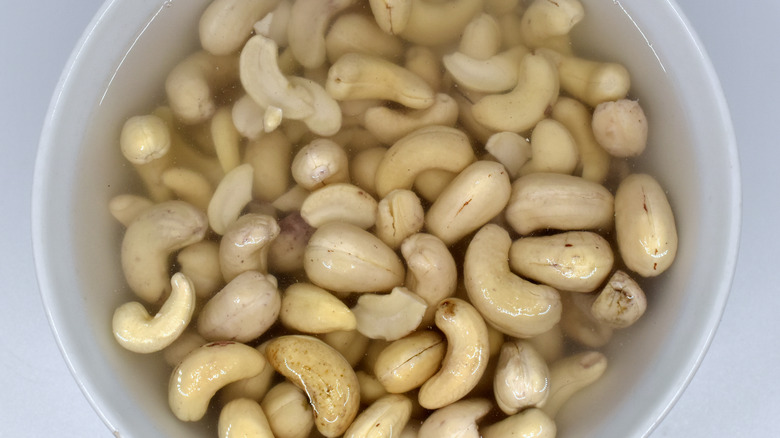 raw cashews soaking in water