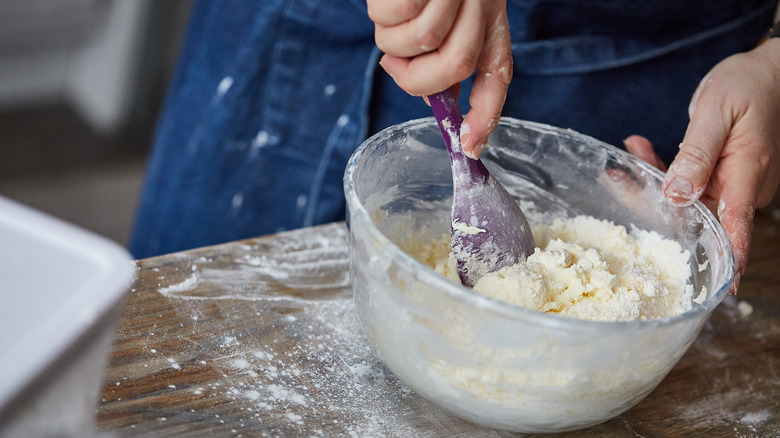 chef mixing cake batter