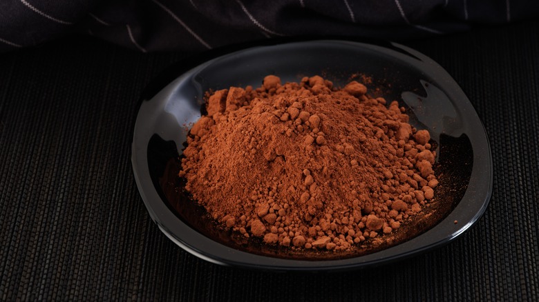 a bowl of cocoa powder