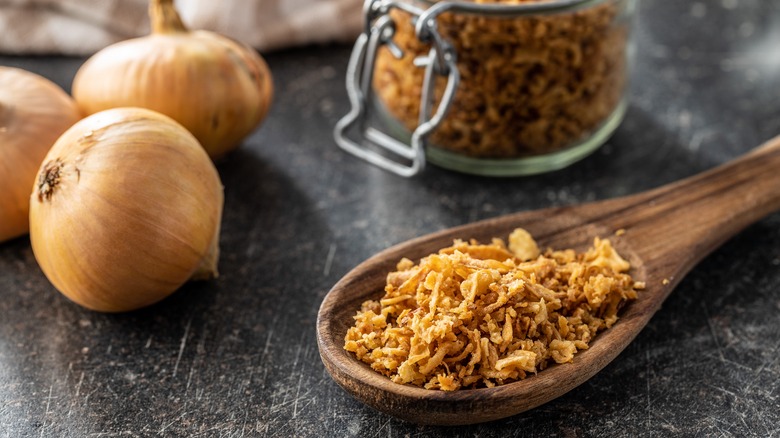 Fried onions on spoon