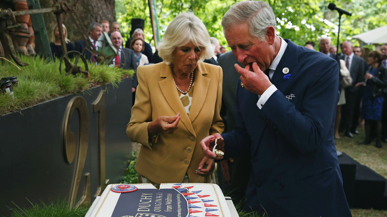 king charles eats birthday cake