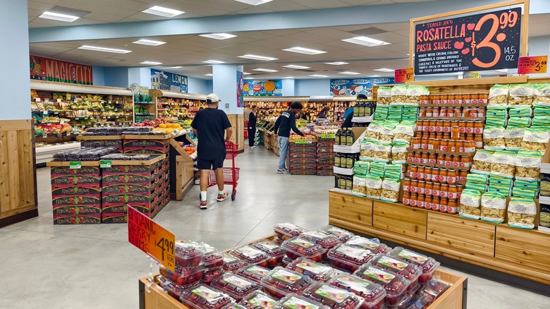 shoppers in Trader Joe's