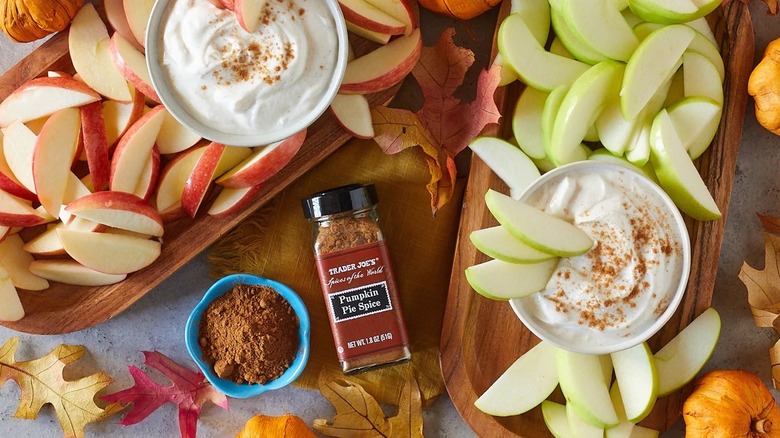 Trader Joe's Pumpkin Pie Spice surrounded by apples