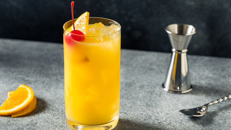 Harvey Wallbanger cocktail garnished with a cherry