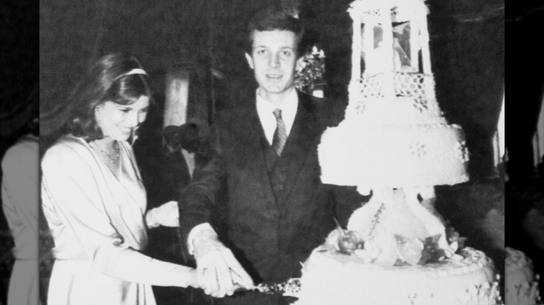 Princess Caroline of Monaco and husband Stefano Casiraghi cut wedding cake in 1983