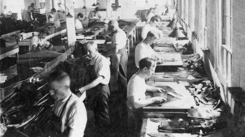 Men working in an early 20th century shoe factory