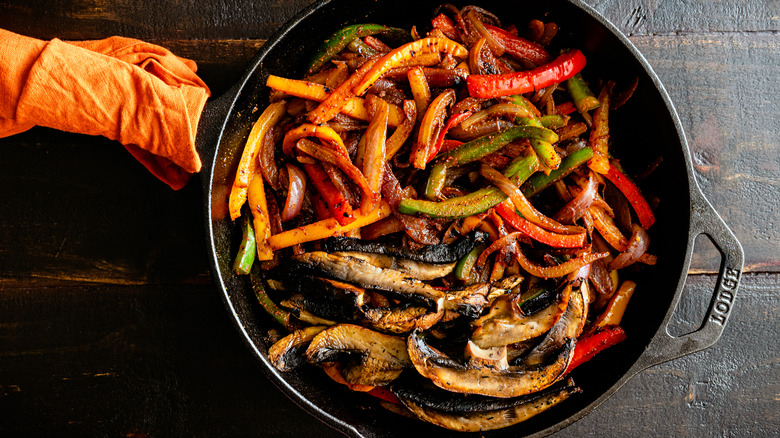 charring vegetables in an iron skillet