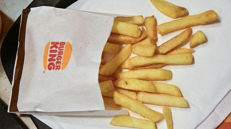 Burger King french fries spilling from bag