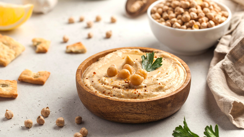 hummus in a wooden bowl