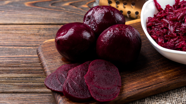 Boiled red beets on cutting board