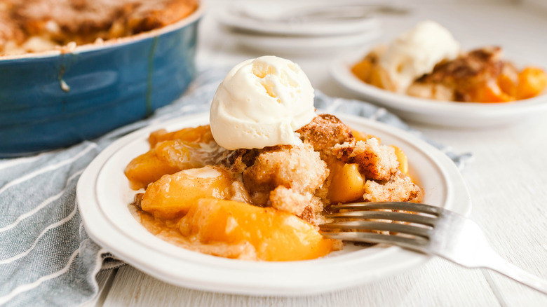 peach cobbler with fork