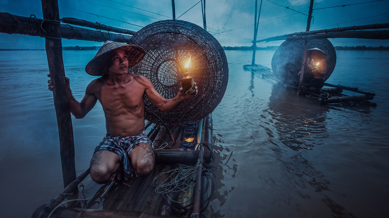 fishermen on mekong river