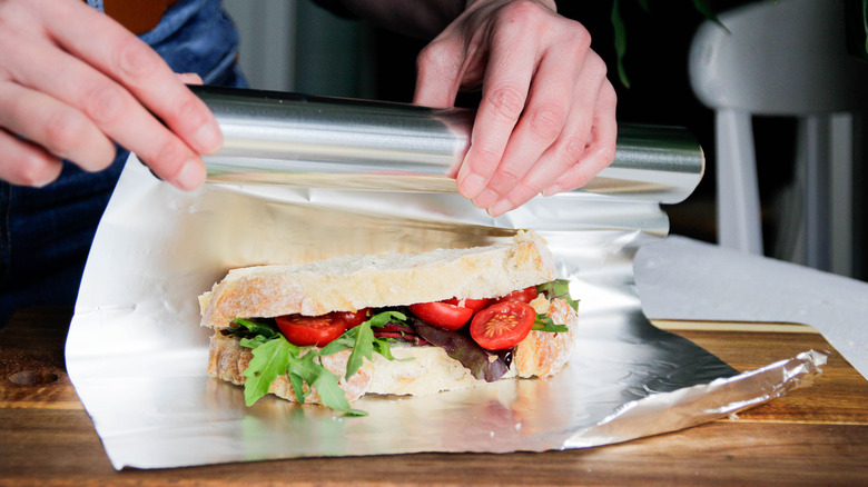 Wrapping food in aluminum foil