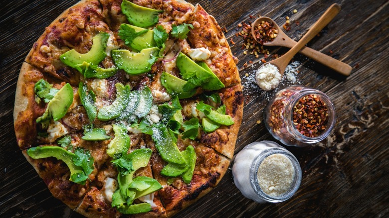 wood oven pizza with avocado
