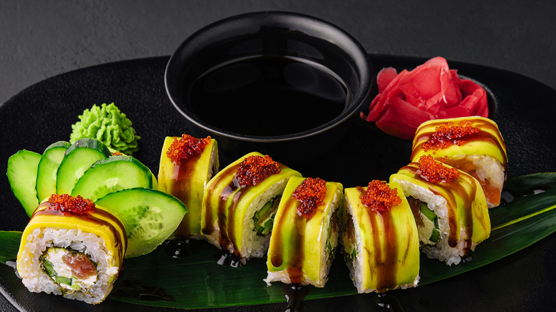 dragon roll on black plate 