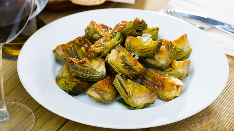 cooked artichokes on plate