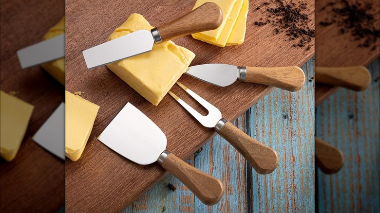 Cheese knifes and forks with cheese