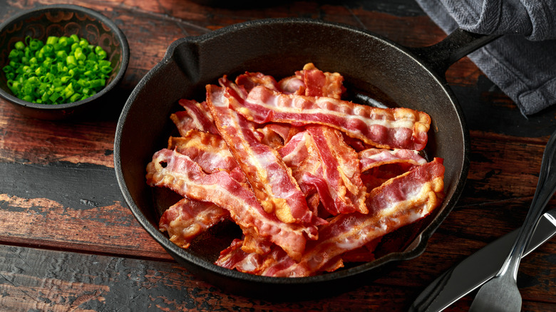 Streaked bacon in cast iron pan