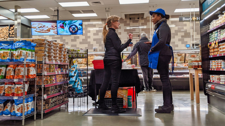 In front of the deli in a QFC store